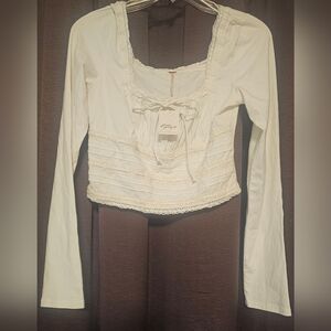 NwtFree People Cream Long Sleeve CropTop With Front detail and string size Small